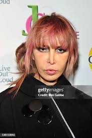 Jesse Snider of The Radley Company and wife Patty Snider attend the... News  Photo