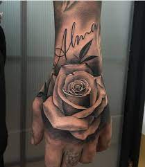 Blue rose tattoo design on ankle. Awesome Rose Tattoo Hand Tattoos For Guys Rose Hand Tattoo Tattoos
