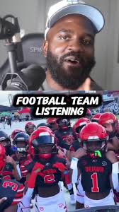 Football Player Walking The Field Pregame Listening to Music