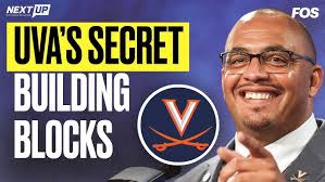 New Virginia WR coach Adam Mims meets with the media