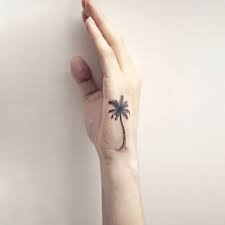 This Tiny Palm Tree Finger Tattoo Is Gorgeous Palm Tattoos Tattoos Tree Tattoo Designs