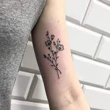 Simple Wildflowers Bundle Tattoo Inked On The Left Arm Tattoos For Women Flowers Simple Flower Tattoo Beautiful Flower Tattoos