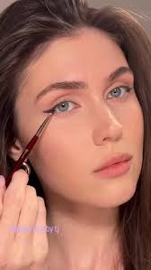 AD . My go to when I'm feeling lazy ! • @yslbeauty All Hours Bronzer 03  @pradabeauty Durable Gliding Eye Pencil 02 Wood @lancomeofficial Lash Idôle  flutter extension lashes @armanibeauty Lip Power