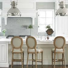 Kitchen islands are actually pieces of fine furniture. Amazing Kitchen Design With Bottega Tiles Blue Glass Tiles Backsplash Pot Filler Ralph Lauren Montauk Xl Pendants White Kitchen Cabinets Modern Farmhouse Kitchens Gray White Kitchen Home Decor