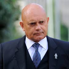 Ray Wilkins in an induced coma after suffering cardiac arrest and fall