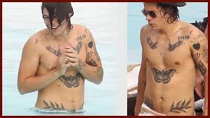 Little harry's age started to show itself at the recent 2021 grammy awards. The Real Reason Why Harry Styles Covered Up His Tattoos Tattoodo