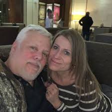 What primer is suggested for cabinet painting?