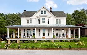 Often seen on older homes, these porches start at the entry and literally wrap around at least one corner and side of the house; Cozy Wraparound Porch Ideas For Homes Of Every Style Better Homes Gardens