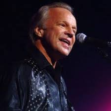 The song "Tell Him No" by Travis & Bob, released in 1959, was written by Travis  Pritchett. Pritchett was one half of the vocal duo, along with Bob Weaver,  who performed the