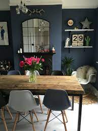Blue floral curtains hang from dining room windows and accent blue grasscloth walls lined white wainscoting. Little Greene Juniper Ash Dark Dining Room Www Overatkates Com Blue Dining Room Decor Dining Room Wall Decor Dark Blue Dining Room