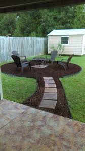 Diy Firepit Area Mulch Stepping Stones Edging Black Paper But Instead Of Mulch Pebbles Or Flat Pave Backyard Landscaping Designs Backyard Backyard Fire