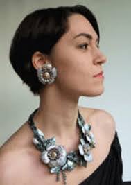 VAL Hunt of ArtHunt a creative recycling artist producing Sculptures, Wall  Hangings, Jewellery and Hats from drink cans and selected rubbish.