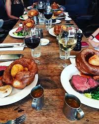 Repost Notsobasiclondon Tbt Sunday Roast Dinners All Around Massive Yorkshire Puddings Stuffed With Potatoes At Hawksm London Food Food Amazing Food