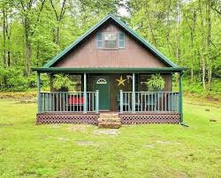 Hidden among the trees in a peacefull, wilderness setting; Ligia S Fork Cabin Rentals New River Tennessee Windrock Atv Park