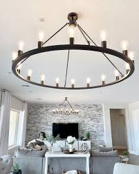 Grand Lighting Fixtures Make All The Difference Don T You Think And Two Are Better Than One These Round Wag Iron Chandeliers Chandelier Round Chandelier