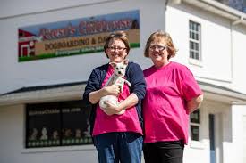 BUSINESS BEAT: Dog day care, boarding business opens in Ona