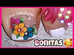 Las niñas deben pintarse las uñas como un juego, como una manera de parecerse a sus madres o a las uñas de los pies tambien se embellecen y mas en verano o primavera en donde están mas. Decoracion De Unas Con 3 Flores Unas Pintadas Con Flores Modelo De Unas Pie Con Flores You Arte De Unas De Pies Unas Pies Decoracion Unas Pintadas Con Flores