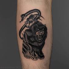 These unique and terrifying creatures resemble the devil himself in human form. Chimera Lion Snake And Goat Tattoo On Leg Black House Tattoo Facebook