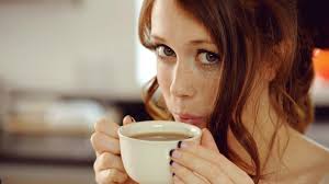 redhead, cup, face, looking at viewer, model, depth of field, Charlotte  Herbert, long hair, coffee, women, freckles, drink, portrait, blow, blue  eyes, HD Wallpaper
