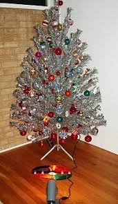 Ok This Brings Back Memories The Silver Christmas Tree With The Rotatin Aluminum Christmas Tree Vintage Aluminum Christmas Tree Silver Christmas Tree