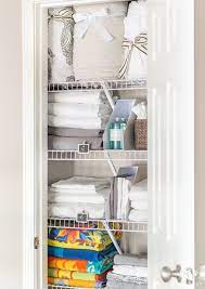 A Small Organized Linen Closet And Ideas To Store Bulky Bedding Kelley Nan Linen Closet Organization Organizing Linens Linen Closet