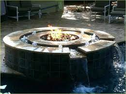 Round fire pit will fit right in with all of your backyard accessories. Hugedomains Com Outdoor Fire Pit Water Fountain Indoor Fire Pit