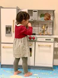 I didn't realize till later that there were white painted screws and regular screws for inside and outside. Kidkraft Uptown Elite White Play Kitchen With Ez Kraft Assembly Walmart Com Walmart Com