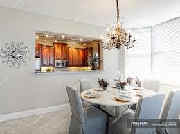 Dining room set high end italian furniture dining room table. Chandelier Over Dining Room Table In Upscale House Palmetto Florida Usa Furniture Indoors Stock Photo 251886469