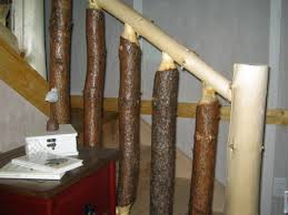 Wooden stair spindles are a classic choice for staircases, especially in period properties. How To Make Log Railings For Your Rustic Cabin Stairway Dengarden