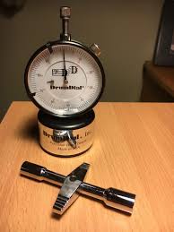 Tuning Your Banjo Head Using A Drum Dial Fretmentors Blog