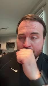 Newsom Playing Guitar