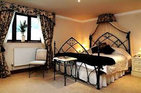 You can add vintage pieces like a colorful large arch made into ornate mirror, or traditional furniture to create a period finish. French Gothic Decorating Ideas