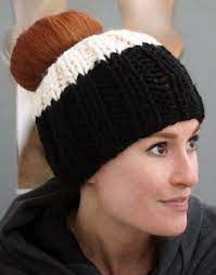 How to make messy bun hats, also known as ponytail hats. Free Knitting Pattern For Ribbed Messy Bun Hat Easy Ponytail Hat Knit In Simple Rib Messy Bun Hat Pattern Messy Bun Knitted Hat Ponytail Hat Knitting Pattern