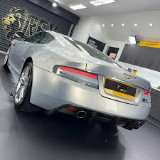 Image result for Lightning Silver 2010 Aston Martin