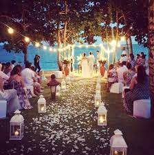 An Early Evening Sunset Beach Wedding Would Be About Perfect Cool Twinkle Lights And No Super Bright Sunshine In Y Outdoor Wedding Dream Wedding Lake Wedding