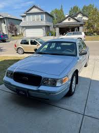 Image result for Light Ice Blue 2003 Crown Victoria