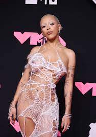 Doja Cat goes nearly naked on MTV VMA red carpet as singer shocks with  daring look in new photos | The US Sun