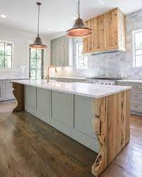 A Gray Kitchen And It S Pecky Cypress Chandelierdevelopment Nashville Peckycypress Graykitchen Kitchen Remodel New Kitchen Cabinets Kitchen Island Design