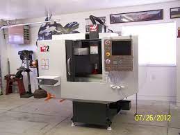 This machine can easily fit in a garage in your home or workshop. Haas Mini Mill In My Garage Metal Working Machines Machine Shop Garage
