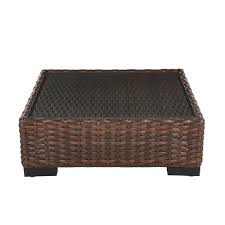 Providing a solid focal point in any living room, coffee tables act as spots to set down refreshments, collect remote controls and display artsy collections of coffee table books (or trashy magazines!). Hampton Bay Commercial Dark Brown Square Wicker Glass Top Outdoor Coffee Table The Home Depot Canada