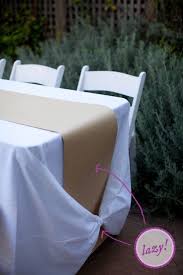 How To Make A Kraft Paper Table Runner Tie A Tablecloth Knot A Practical Wedding Paper Table Runner Wedding Paper Table Paper Table Runner