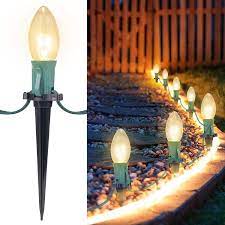 Christmas Sidewalk Lights Amazon Com Christmas Pathway String Lights Outdoor 25 7 Feet C9 20 Clear Lights Warm White With 20 Stakes Extendable Waterproof For Outdoor Walkway Lights Driveway Christmas Lights Use Ul Listed Tools Home Improvement