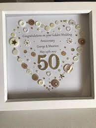 Golden anniversary gifts also represent harmony, commitment and optimism. Golden Wedding Anniversary Button Art Frame Golden Wedding Etsy Golden Anniversary Gifts 50th Anniversary Gifts 50 Wedding Anniversary Gifts