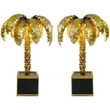 It has a magnificent antique gold finish with a beautiful deep emerald green velvet shade. Gold Palm Tree Table Lamp For Sale At 1stdibs