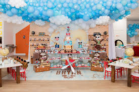 Pom poms can be hung from the ceiling or used as a half puff to make a unique flower centerpiece to decorate a gift, card or dessert table. Cool Aviator Mickey Mouse Birthday Party Pretty My Party Party Ideas
