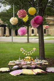 Decorate the party table in bright colors such as yellow, pink, orange, blue and green. Sweet And Sunny Lemonade 10th Birthday Party Kara S Party Ideas Summer Party Decorations Garden Party Decorations Picnic Birthday Party