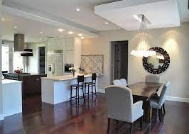 What are lights on the ceiling called? Kitchen And Dining Area Lighting Solutions How To Do It In Style Dining Room Lighting False Ceiling Living Room False Ceiling Design