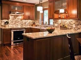 Older kitchen remodel on a budget with fantasy white granite countertops and. Choosing Backsplash Tile For Busy Granite Countertops Toni Schefer Design