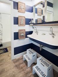 Whether you're dealing with a tiny powder room or a shower stall that's basically on top of the toilet (been there!), a small bathroom can make morning and evening routines a lot less glamorous and—more importantly—less efficient. 31 Nautical Coastal Beach Bathroom Decor Ideas Sebring Design Build