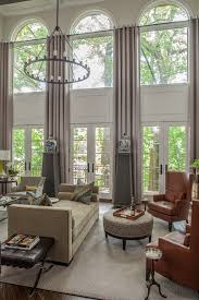 Tall Window Treatments Stationary Grommet Topped Draperies Arched Top Windows Window Treatments Living Room Living Room Windows Arched Window Treatments